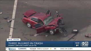 Crash sends three to hospital in north Phoenix