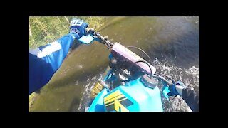 NOOB rider crashes 200cc dirt bike in to river