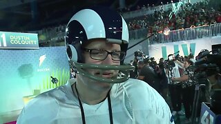 Reporter dresses as 'Punt Pass Kick' Andy Reid at Super Bowl media night