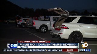 Families flock to drive-in theatre's reopening