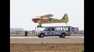 Stunt Plane Lands On Roof Of Pickup Truck