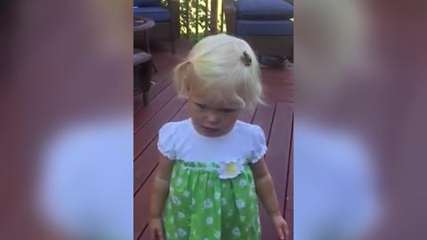 Funny Tot Girl Has A Frog On Her Head