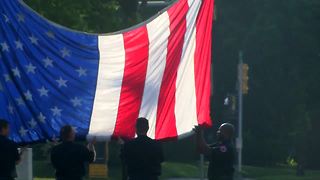 Funeral Procession Passes District 4