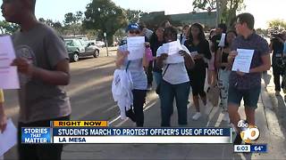 Students march to protest officer's use of force