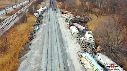 Drone footage captures mangled aftermath of train derailment in Indiana