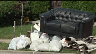 Communities deal with waterlogged trash