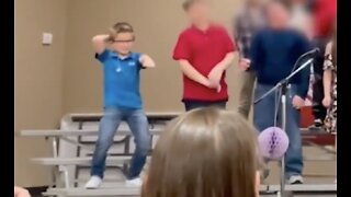 Boy's Hilarious Dance Moves Crack up School Audience