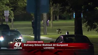 Pizza delivery driver robbed at gunpoint in Lansing