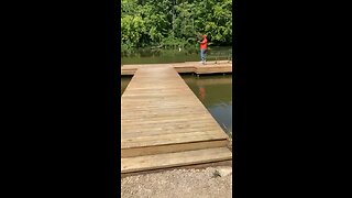 Friend catching first fish at 60 years old