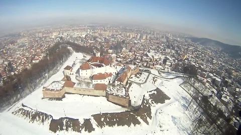 Take a POV paragliding flight over historic European site