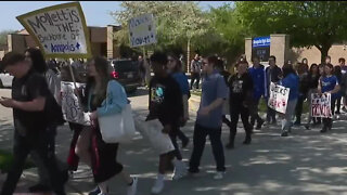 Students protest principal's suspension