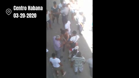 Cuban police beats a woman for selling clothes