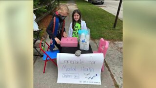 8-year-old raises money for mental health awareness with lemonade stand after dad dies by suicide