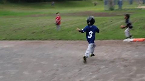Kid hits simple grounder, results in epic home run