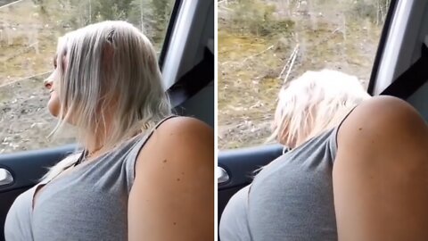 Guy pranks wife by rolling window down while she's sleeping