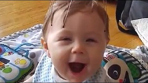 Baby's Priceless Reaction To Scalp Massager