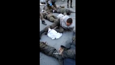 WAR CRIMES - Ukrainian NAZIS shoot Russian surrender soldiers