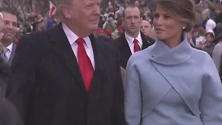 President Trump gets out of limousine to walk in Inaugural Parade