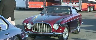 Concour d'Elegance parades classic cars down strip