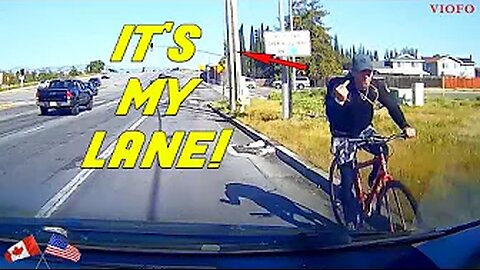 WRONG WAY CYCLIST IS MAD AT ONCOMING TRAFFIC