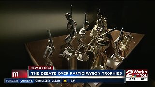 Should child athletes get participation trophies or medals?