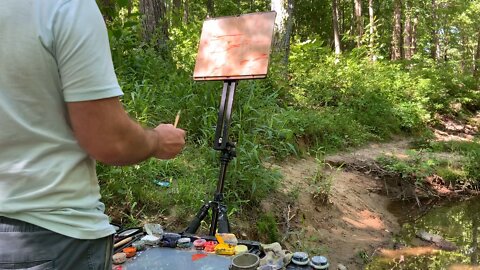 Plein air painting a creek using acrylics