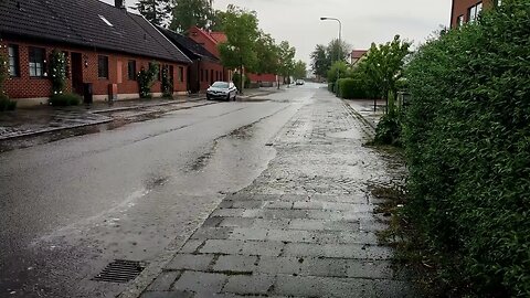 Heavy rain over an empty residential street in south of Sweden