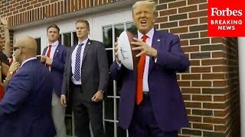 WATCH: Trump Tosses Footballs To Crowd In Iowa