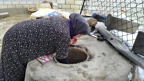 An unusual oven in an aul in the Caucasus Mountains. WINTER in Dagestan. Russia