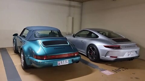 911 GT3 Touring or 911 Cabrio Turbo Look Wimbeldon Green? What a size difference!