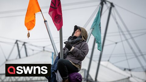 Extinction Rebellion XR activists block the entrance to the Schlumberger Gould, Cambridge