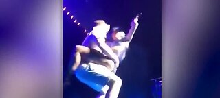 Lady Gaga and fan fall off stage