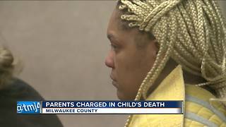 Parents charged in 9-year-old daughter's death