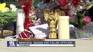 Memorials form for fallen Kissimmee police officers