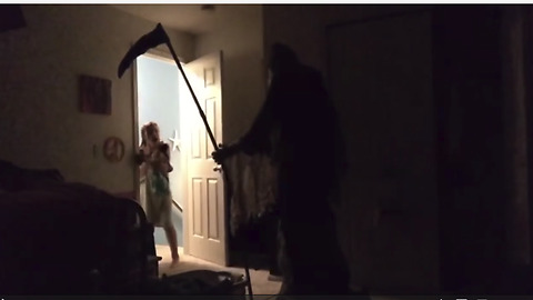 Dad scares daughter to tears with Grim Reaper prank