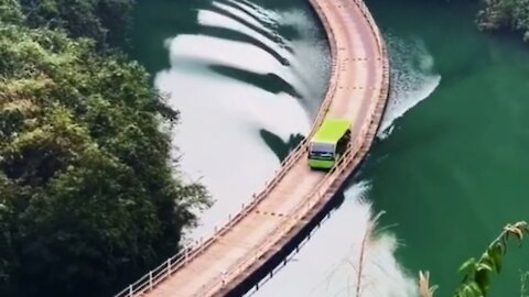 Breathtaking footage of a bus over a floating bridge