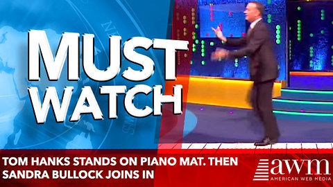 Tom Hanks Stands On Piano Mat. Then Sandra Bullock Joins And They Play “Chopsticks” With Their Feet
