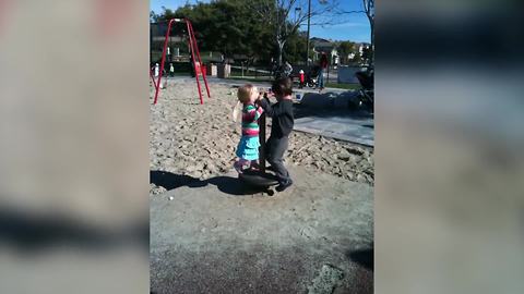 Two Toddlers Get Dizzy After Spinning On A Roundabout