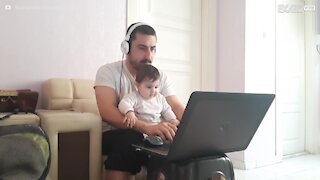 Baby makes dad's work from home impossible!