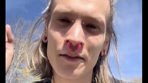 Trans activist with massive pink nose ring tells young children to reach out to him online