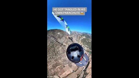 Paraglider gets tangled in his own chute