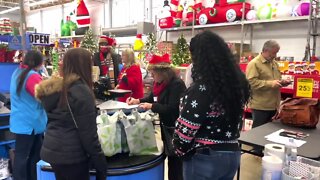 Volunteers and staff spread holiday cheer for shelter families