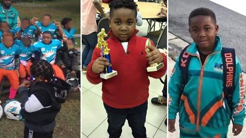 A little boy is shot & killed by stray bullet while playing video games.