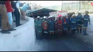 Jubilant workers emerge from underground after ending a nine-day sit-in at Rustenburg mine (ReH)