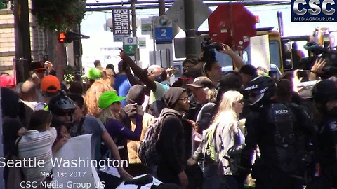Fists And Glitter Fly As Tensions Boil Over At Seattle #MarchAgainstSharia
