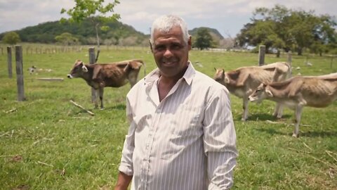 Happy Farmer Smiling At Camera Man Peasant In Farm