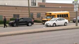 Several people exchange gunfire during argument, striking 2 school buses