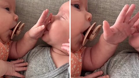 Baby Lets Twin Use Finger As Pacifier
