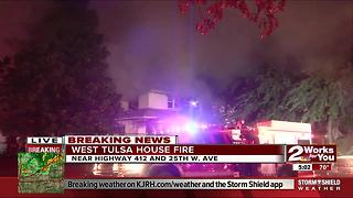 Firefighters dealing with house fire in West Tulsa