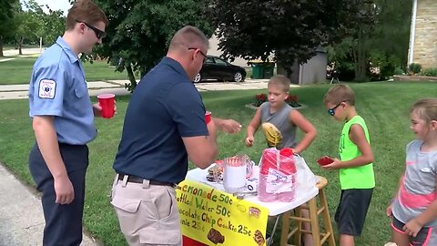 West Bend ambulance crew puts smiles on the faces of little kids running a lemonade stand